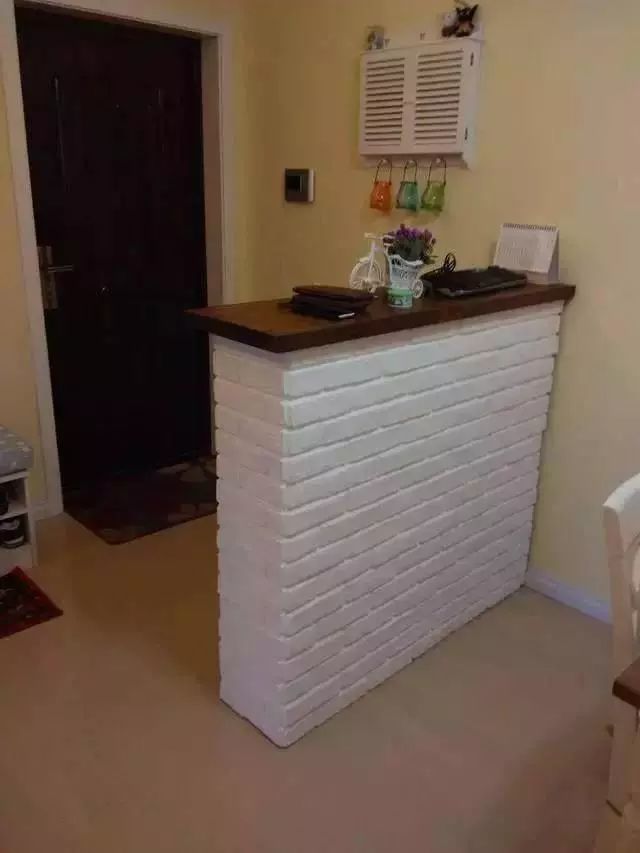 新房装修,玄关和餐厅砌了一堵墙,朋友说是收银台!